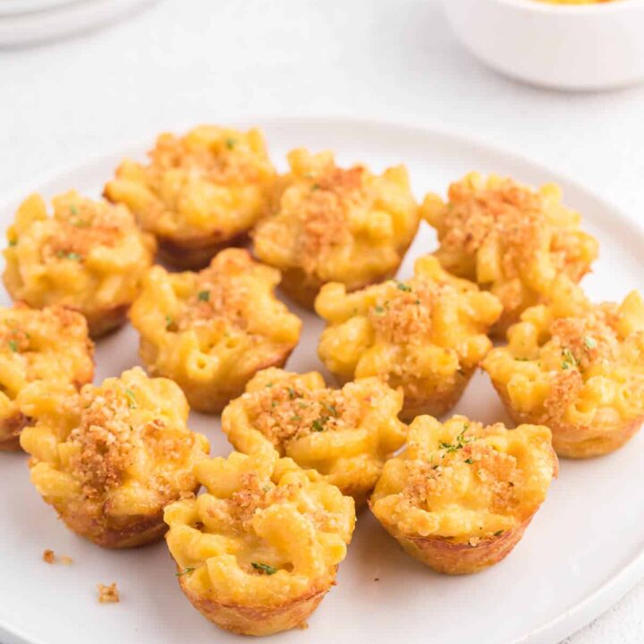 Mac and Cheese Cups - Comfort food in a cup! The perfect cozy, cheesy side dish, but handheld for appetizers and tailgating.
