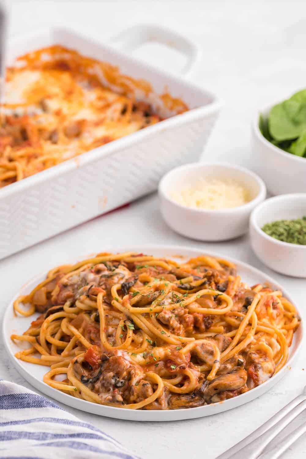 Spaghetti bake serve on a white plate