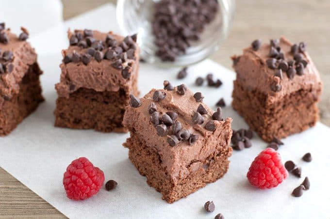 Chocolate Raspberry Brownies - Rich, knock-your-socks off good! These fudgy brownies are made from scratch and topped with a creamy chocolate raspberry frosting.