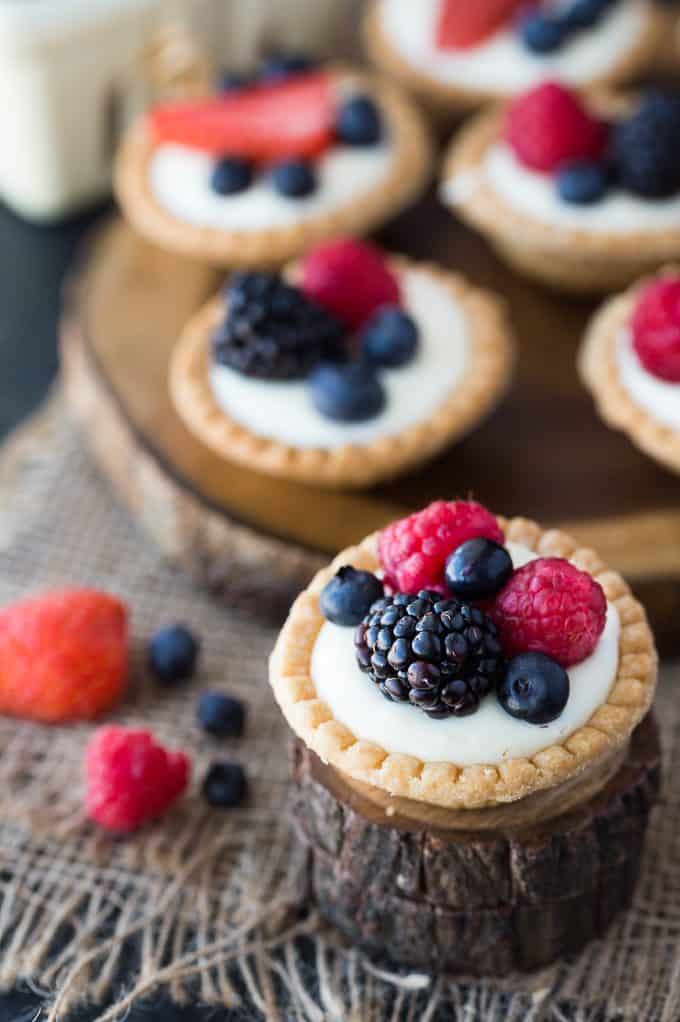 Cream Cheese Fruit Tarts - Super creamy with a crunch. A fresh and fruity bite-size take on cheesecake!