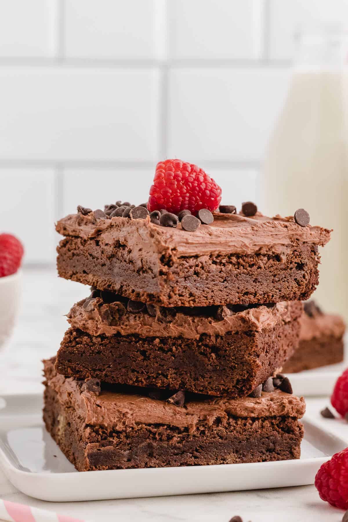 A stack of chocolate raspberry brownies.
