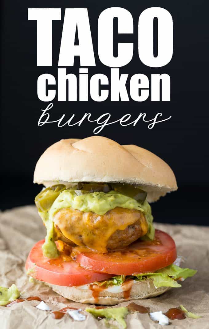 Taco Chicken Burgers - Switch it up for Mexican night! These healthier oven-baked chicken burgers are made with taco seasoning and topped with guacamole, jalapenos, and of course, cheese.