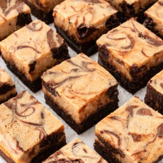 Peanut butter cheesecake brownies cut into bars.