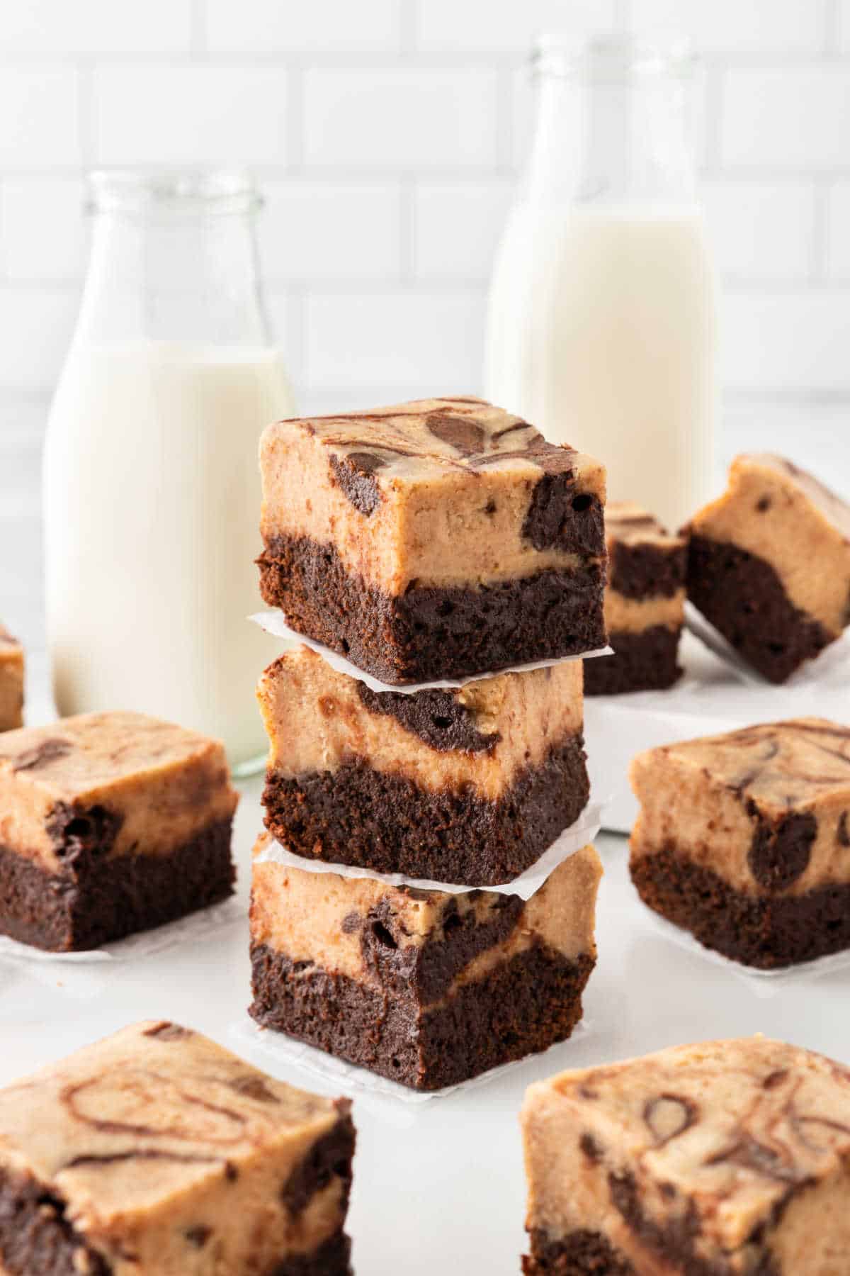 A stack of peanut butter cheesecake brownies.