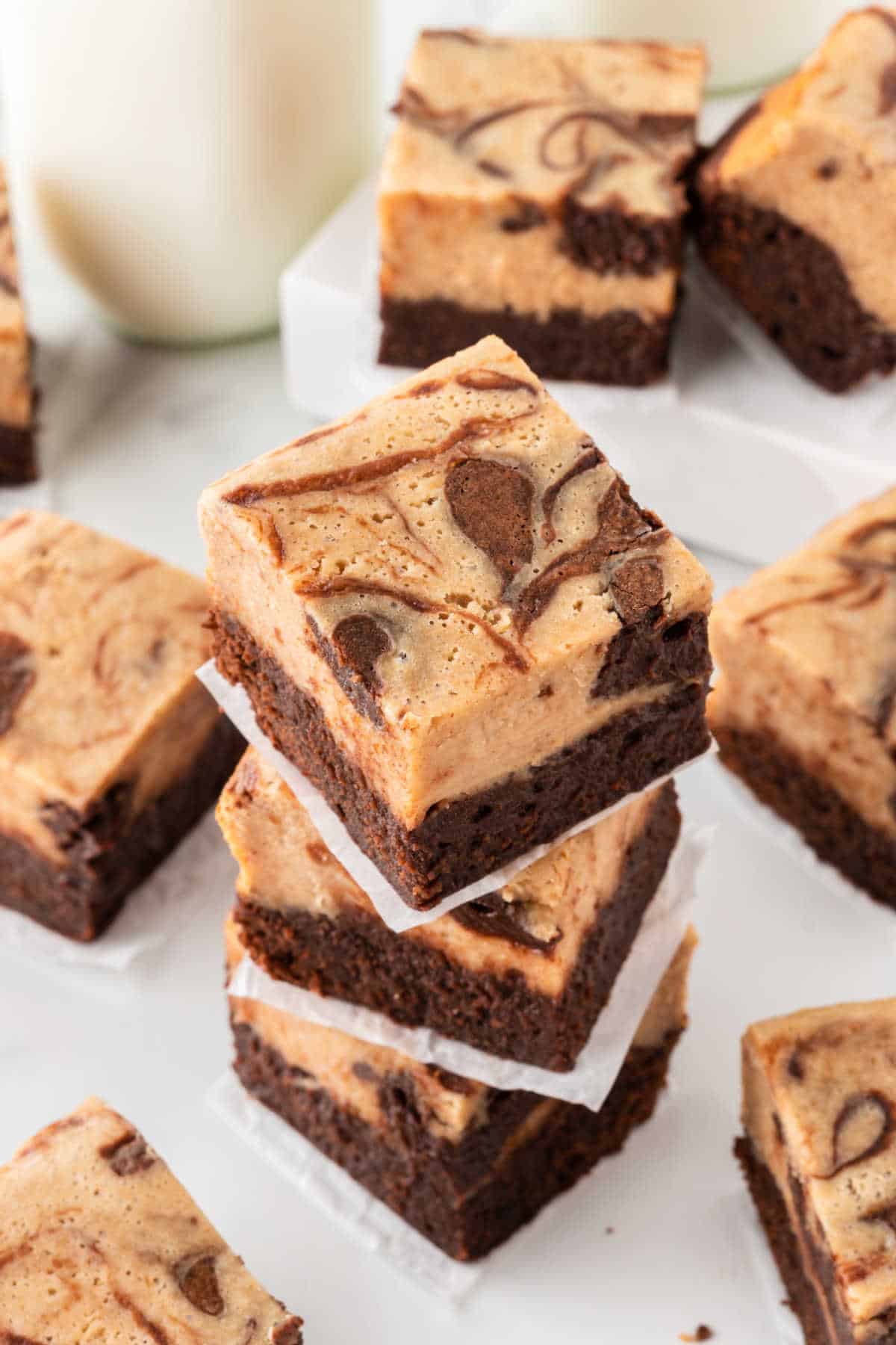 A stack of peanut butter cheesecake brownies.