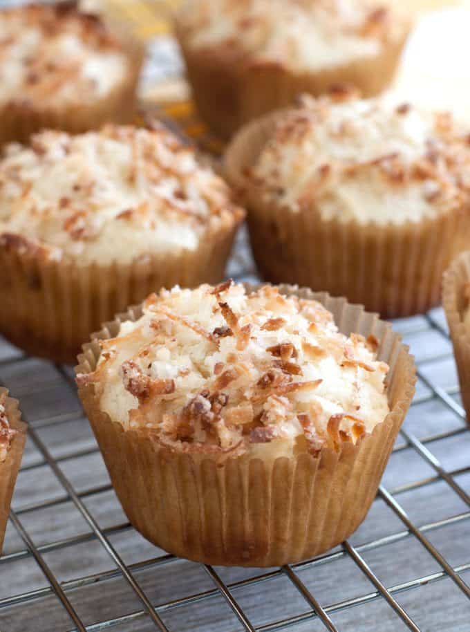Toasted Coconut Muffins - These easy to make muffins are my daughter's favorites! Enjoy the delicious coconut flavor and toasted coconut streusel topping.