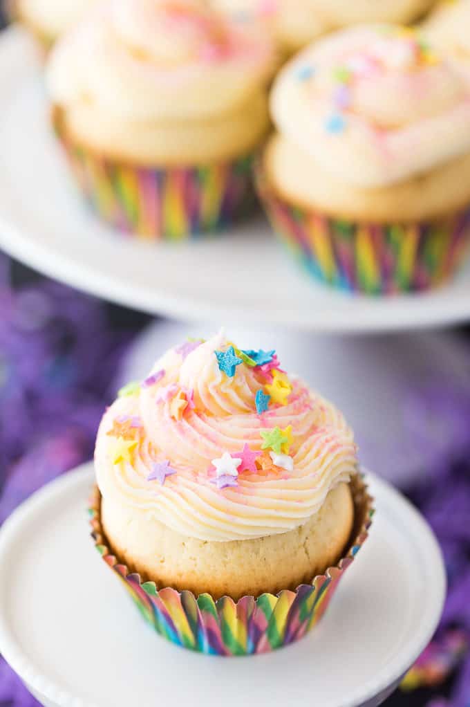 SING Inspired Cupcakes - Sweet vanilla cupcakes with a star surprise inside and topped with a smooth vanilla buttercream. Make a batch for your next family movie night to go with the movie, SING!