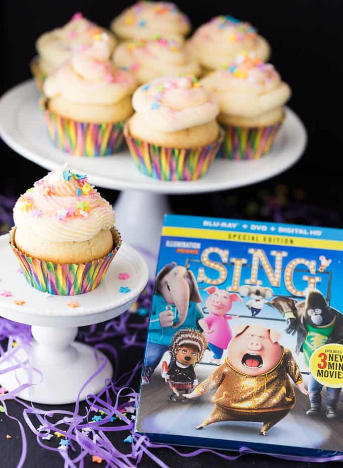 SING Inspired Cupcakes - Sweet vanilla cupcakes with a star surprise inside and topped with a smooth vanilla buttercream. Make a batch for your next family movie night to go with the movie, SING!