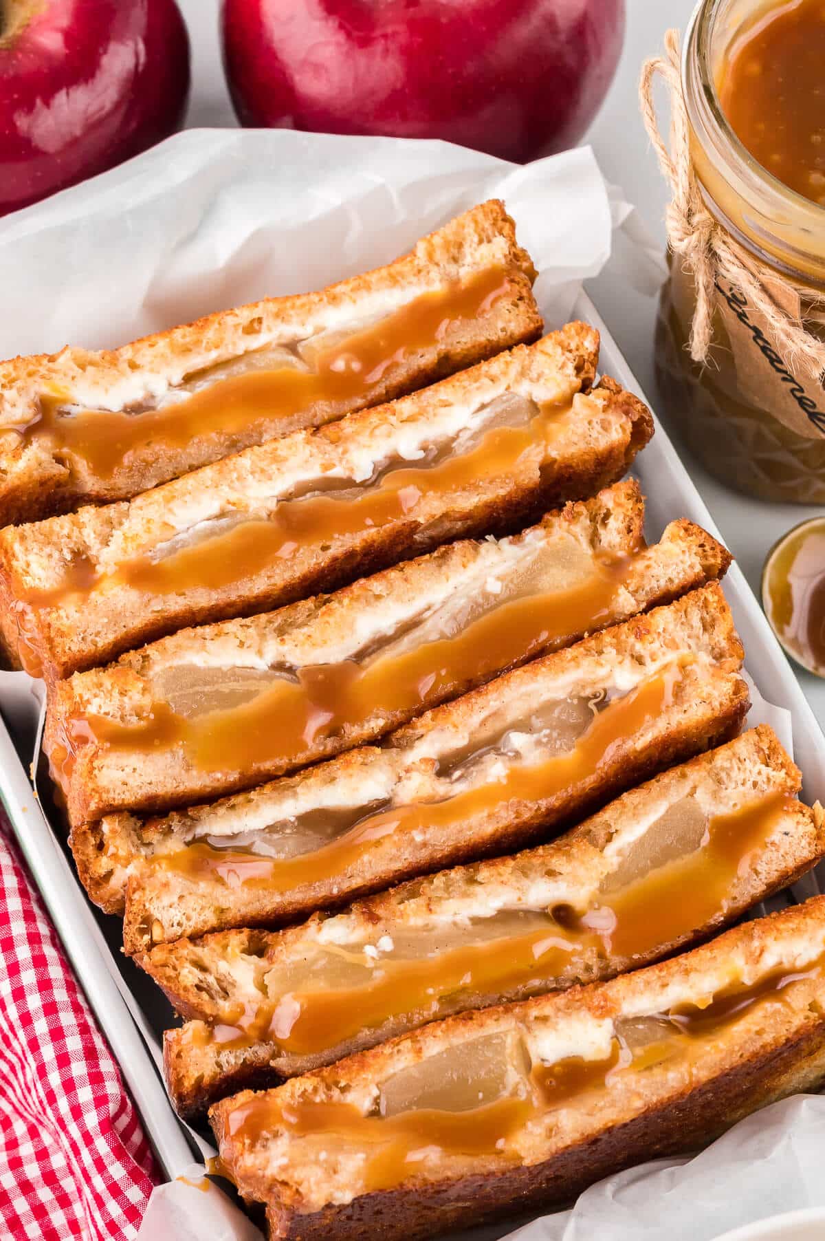 Caramel apple grilled cheese sandwiches in a pan.