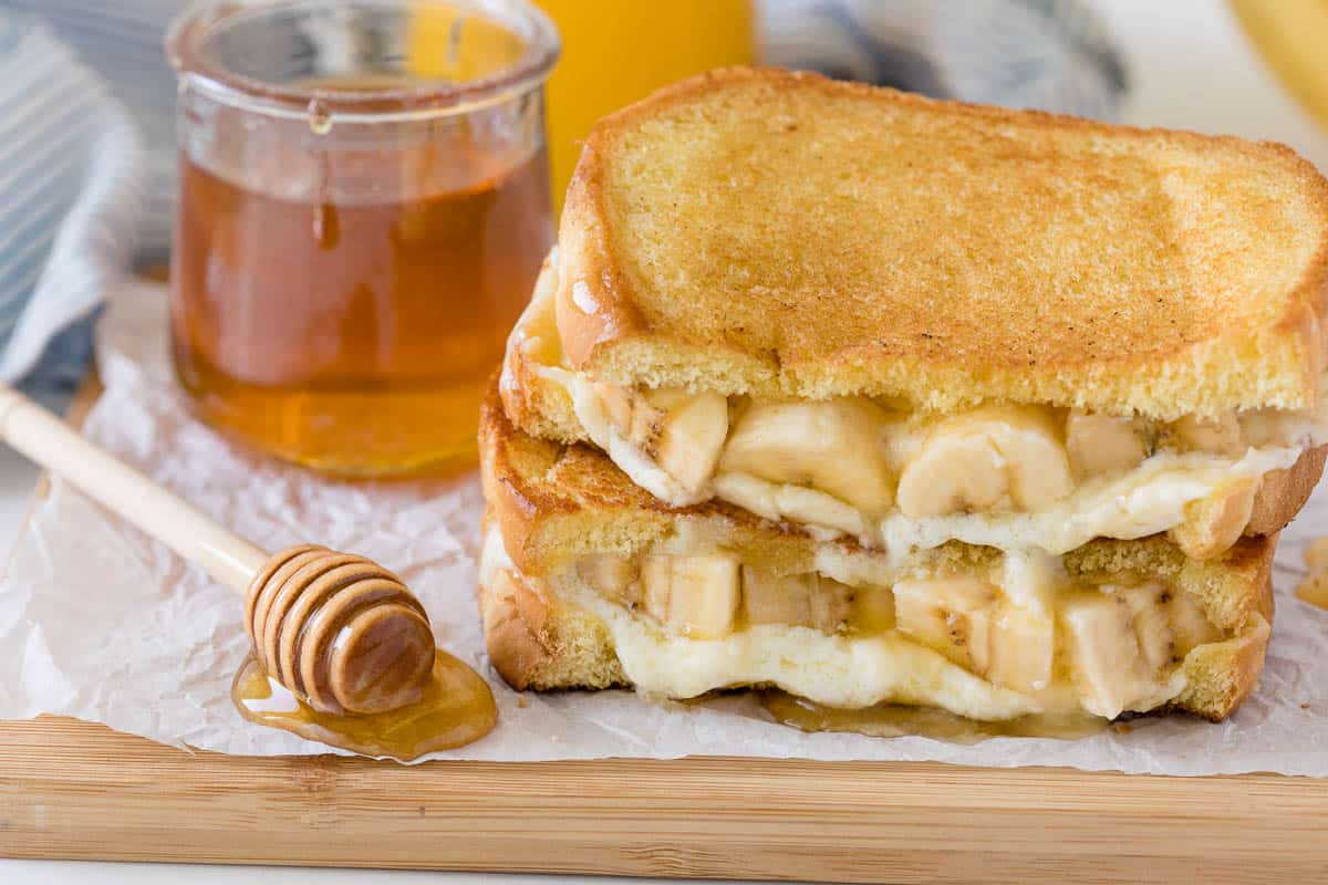 Honey Banana Grilled Cheese on a cutting board.