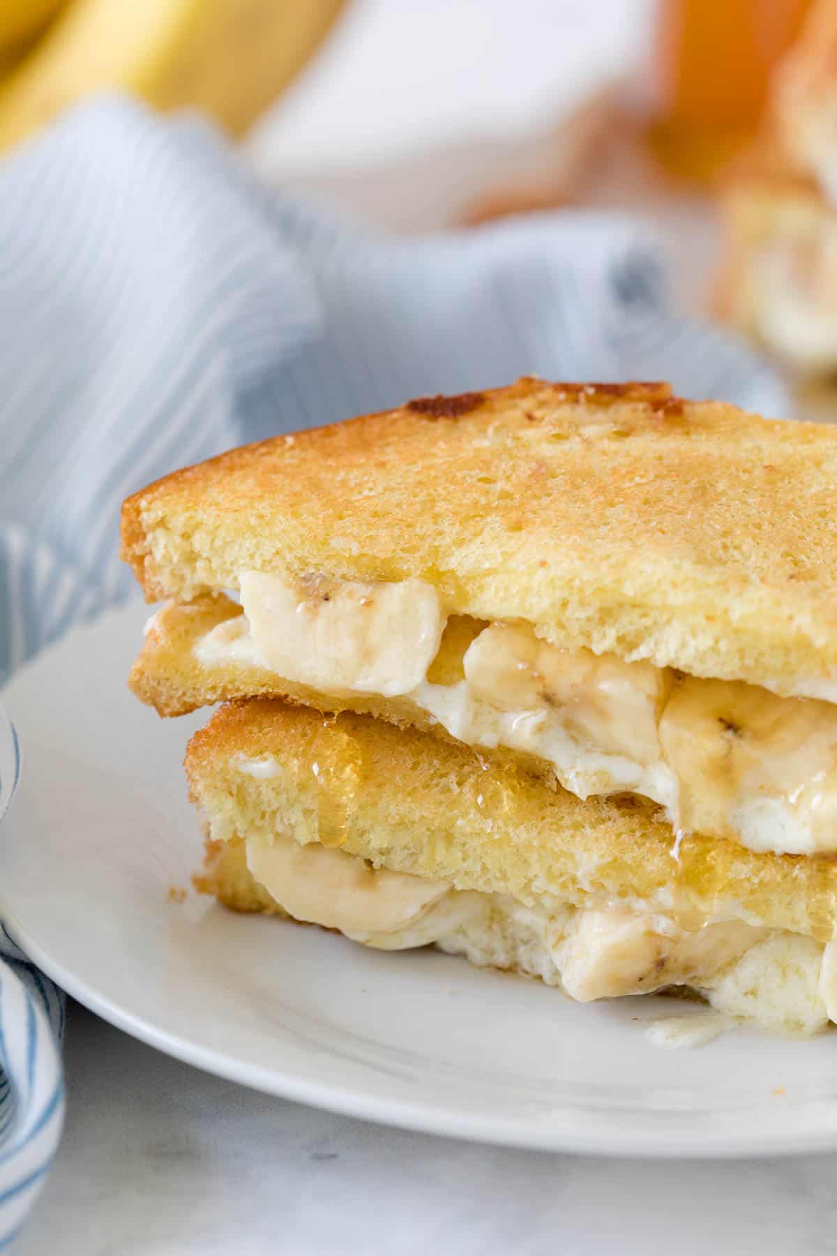 Honey banana grilled cheese on a plate.