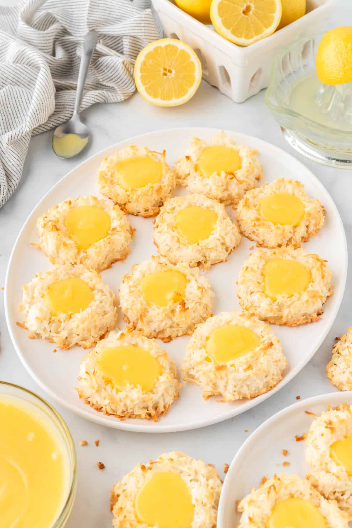 Lemon curd coconut macaroons on a plate.