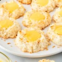 Lemon curd coconut macaroons on a plate.