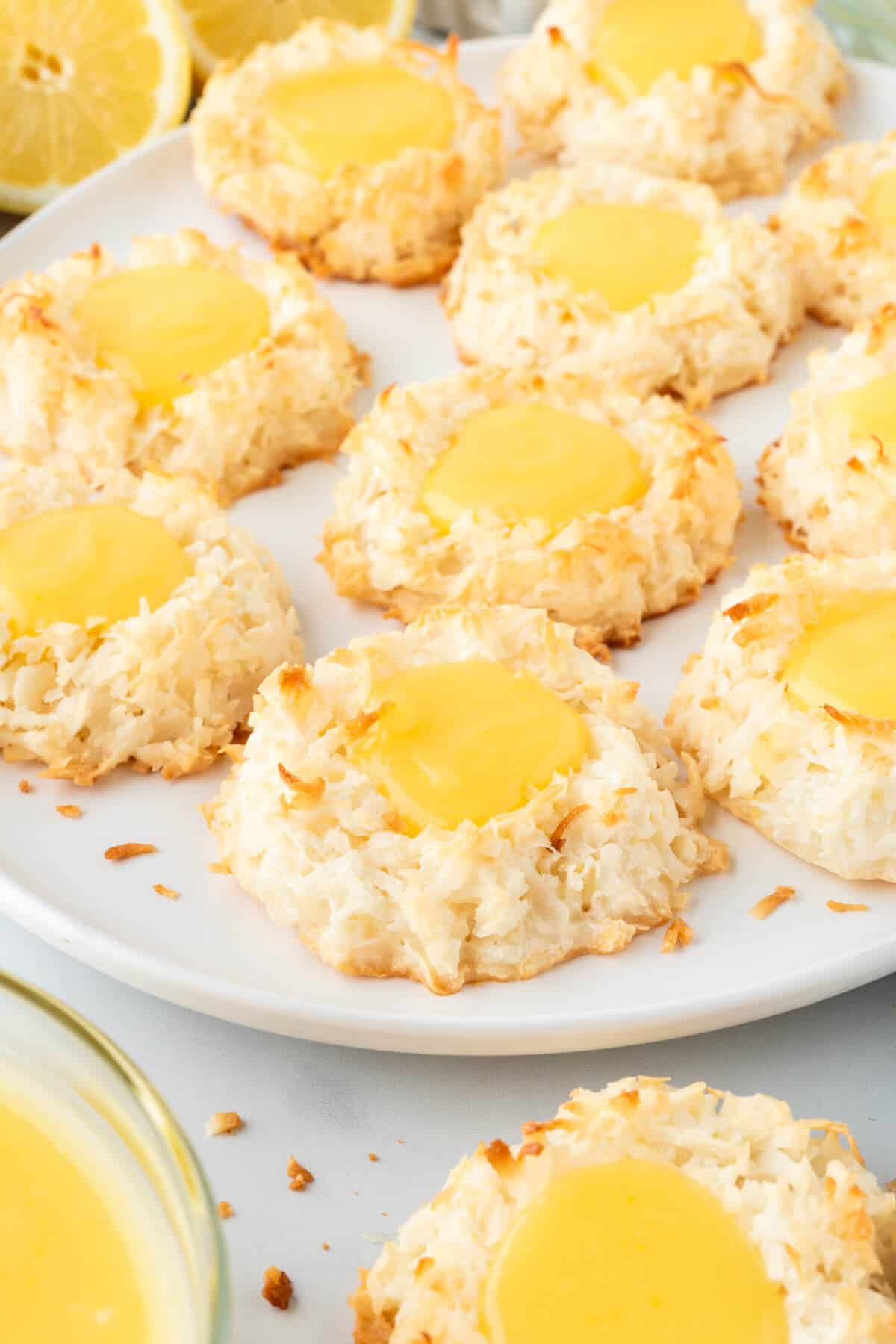 Lemon curd coconut macaroons on a plate.