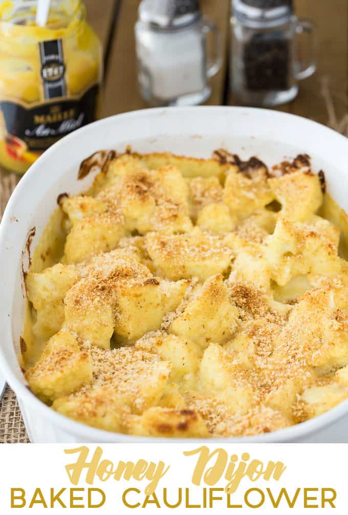 Honey Dijon Baked Cauliflower - This easy side dish is hearty enough for Meatless Monday! This cauliflower casserole recipe is super tangy and covered in breadcrumbs and Parmesan cheese. Yum!