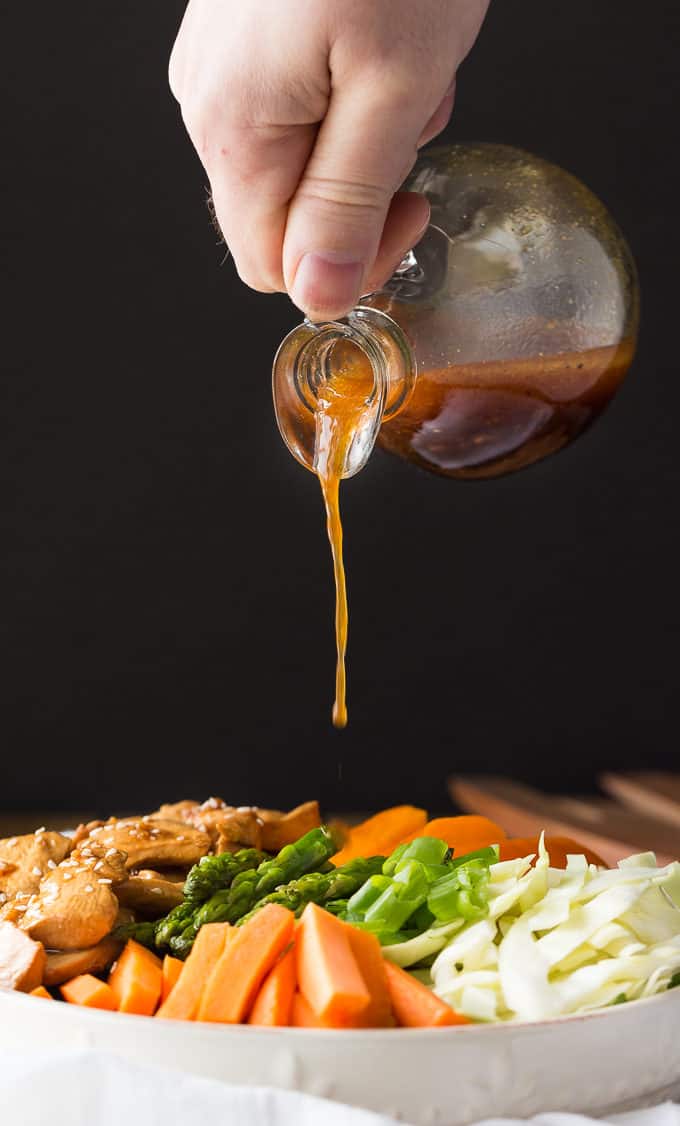 Chicken & Asparagus Salad - A delicious spring salad packed with veggies, seasoned chicken and a tangy Sesame Ginger dressing.