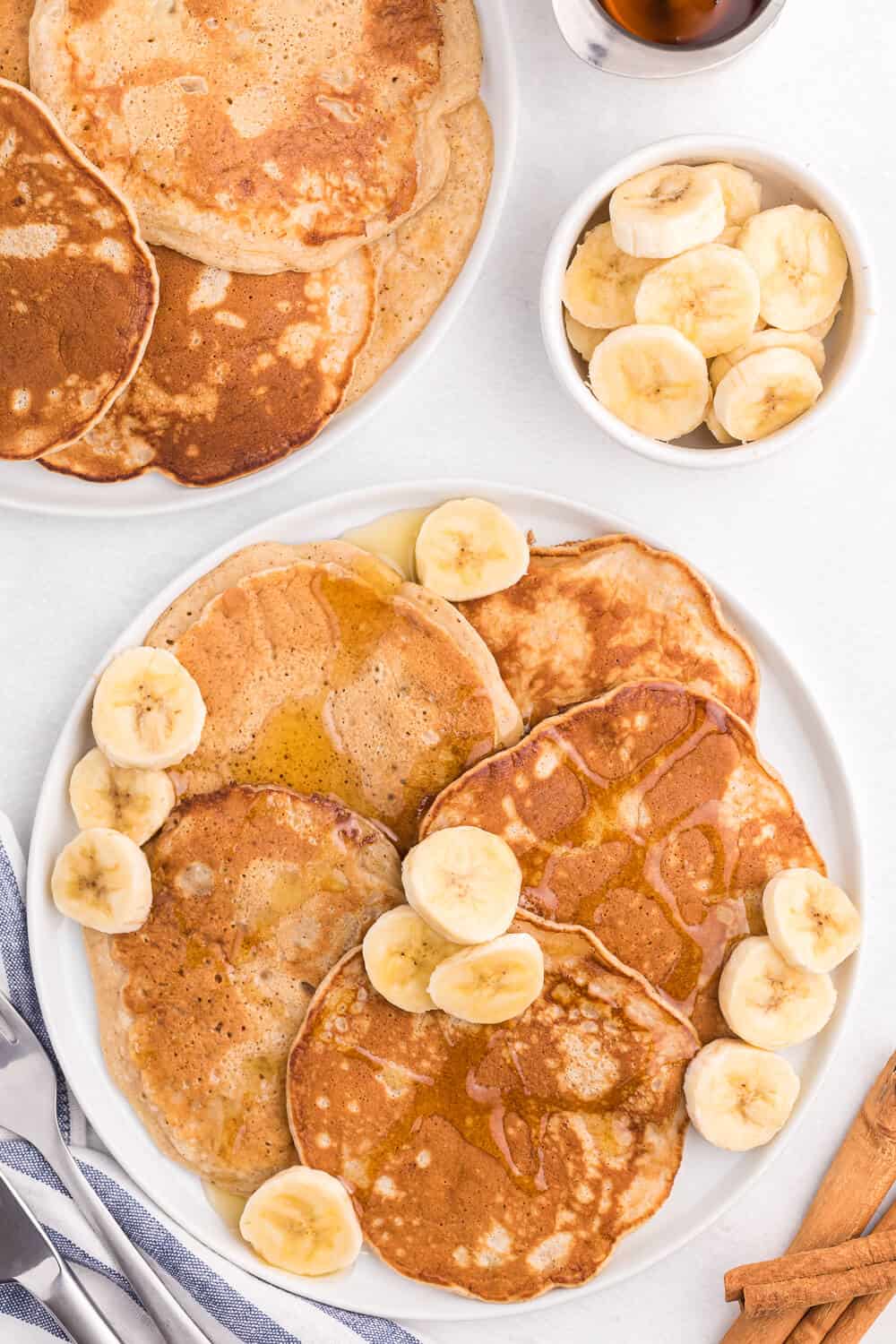 Cinnamon Banana Pancakes - Add some cinnamon and bananas to your next batch of pancakes. My family gobbled this delicious breakfast up in record time!