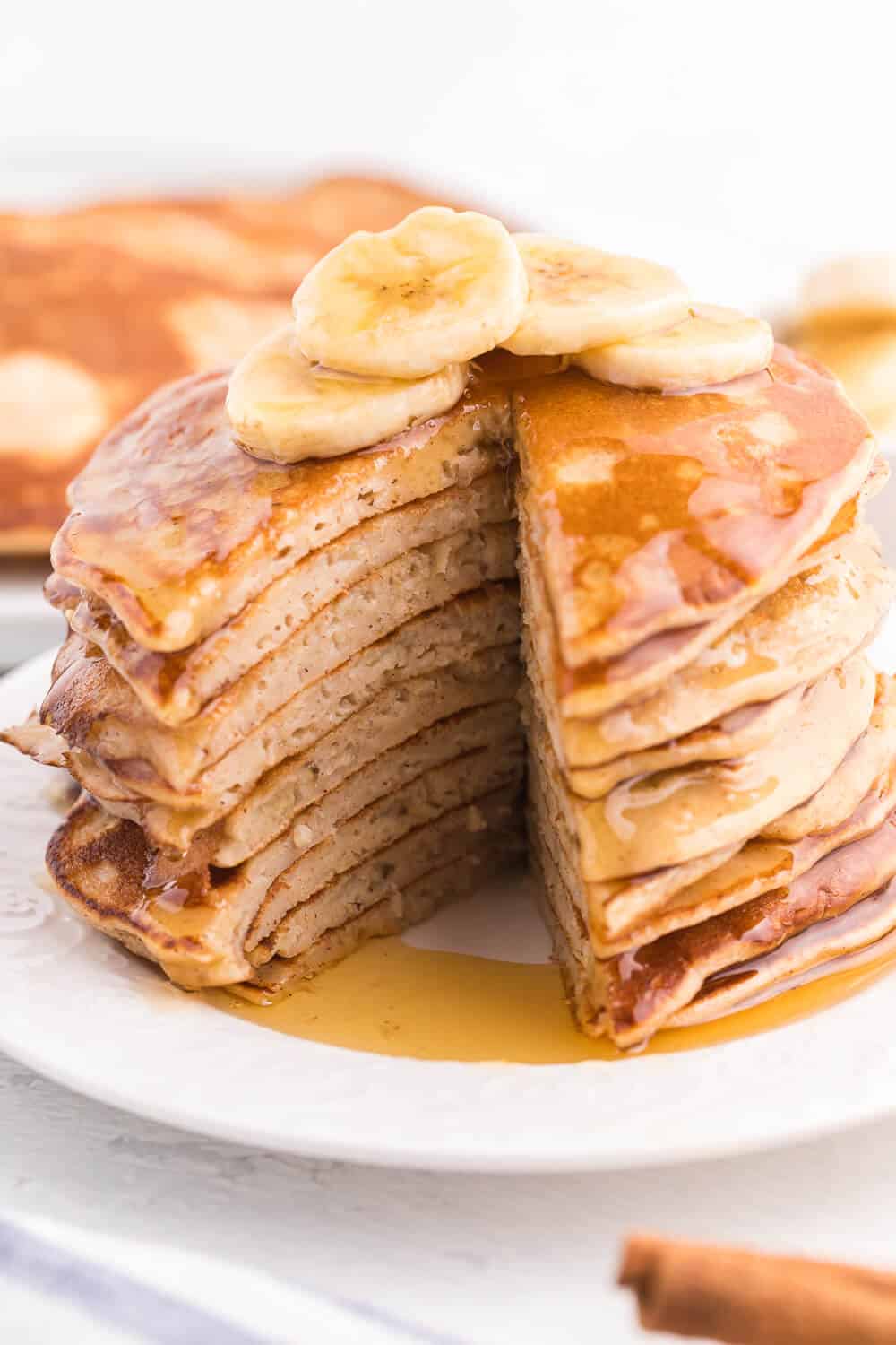 Cinnamon Banana Pancakes - Add some cinnamon and bananas to your next batch of pancakes. My family gobbled this delicious breakfast up in record time!