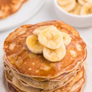 Cinnamon Banana Pancakes - Add some cinnamon and bananas to your next batch of pancakes. My family gobbled this delicious breakfast up in record time!