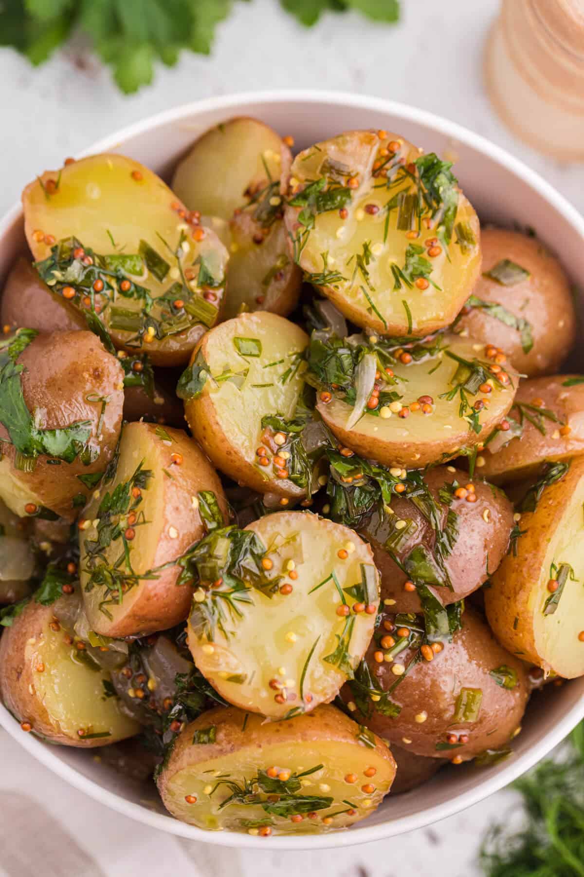 Herb potato salad in a bowl.