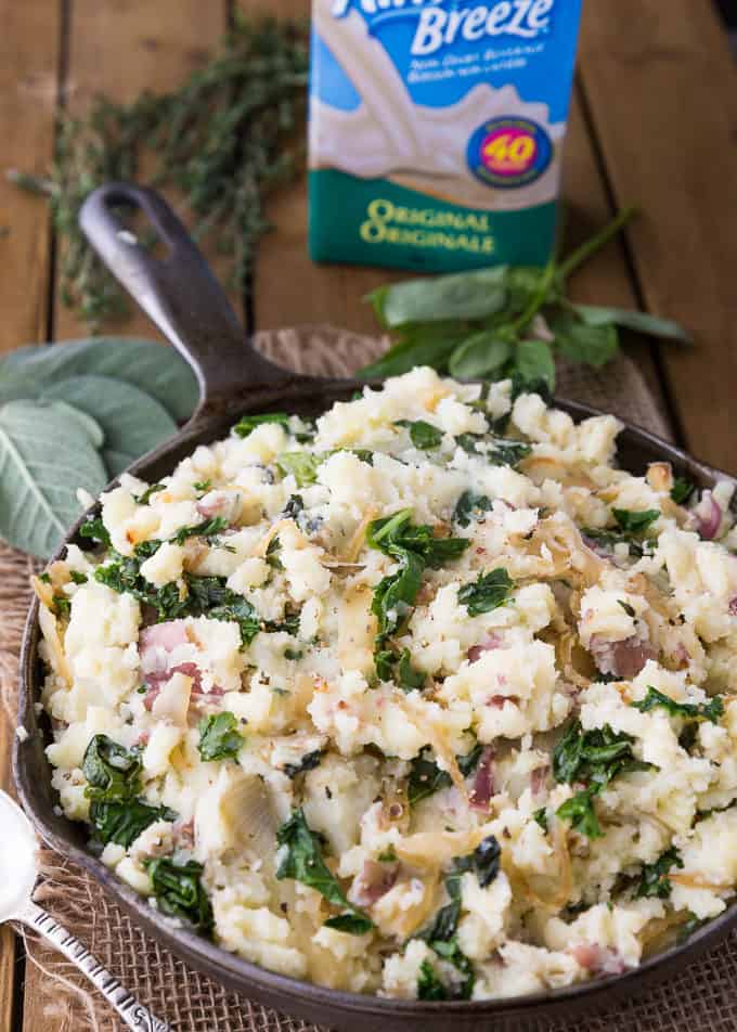 Olive Oil Mashed Potatoes wIth Kale & Herbs - Skip the dairy for these garlic & herb mashed potatoes. This flavorful side dish is great for holiday dinners or weeknight meals.