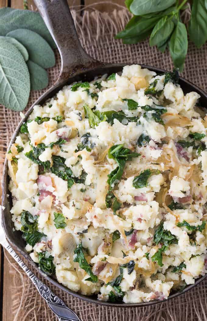 Olive Oil Mashed Potatoes wIth Kale & Herbs - Skip the dairy for these garlic & herb mashed potatoes. This flavorful side dish is great for holiday dinners or weeknight meals.