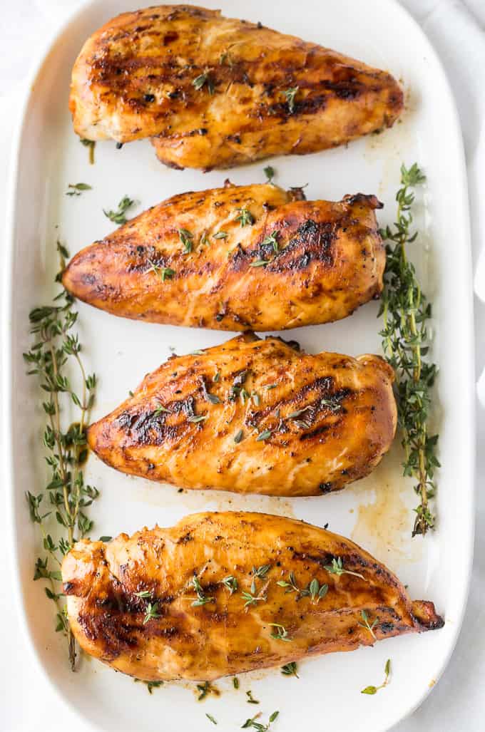 Maple Dijon Grilled Chicken - Maple syrup and Dijon mustard are a match made in heaven and taste delicious on a grilled chicken breast.