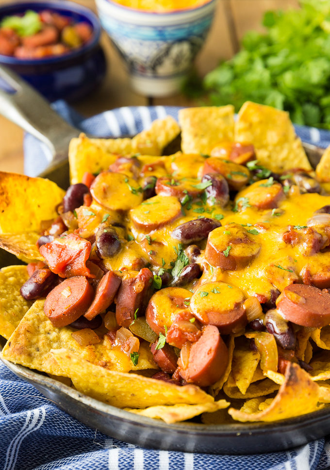 Spicy Chili Nachos - A little heat and a lot of flavor! Spice up your party with this mash-up appetizer of chili dogs and crunchy nachos.