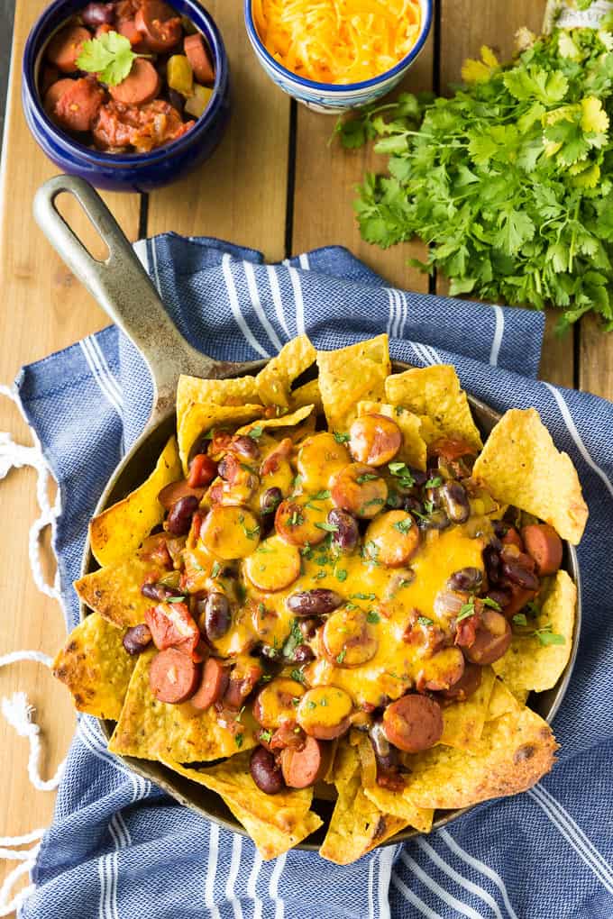 Spicy Chili Nachos - A little heat and a lot of flavor! Spice up your party with this mash-up appetizer of chili dogs and crunchy nachos.