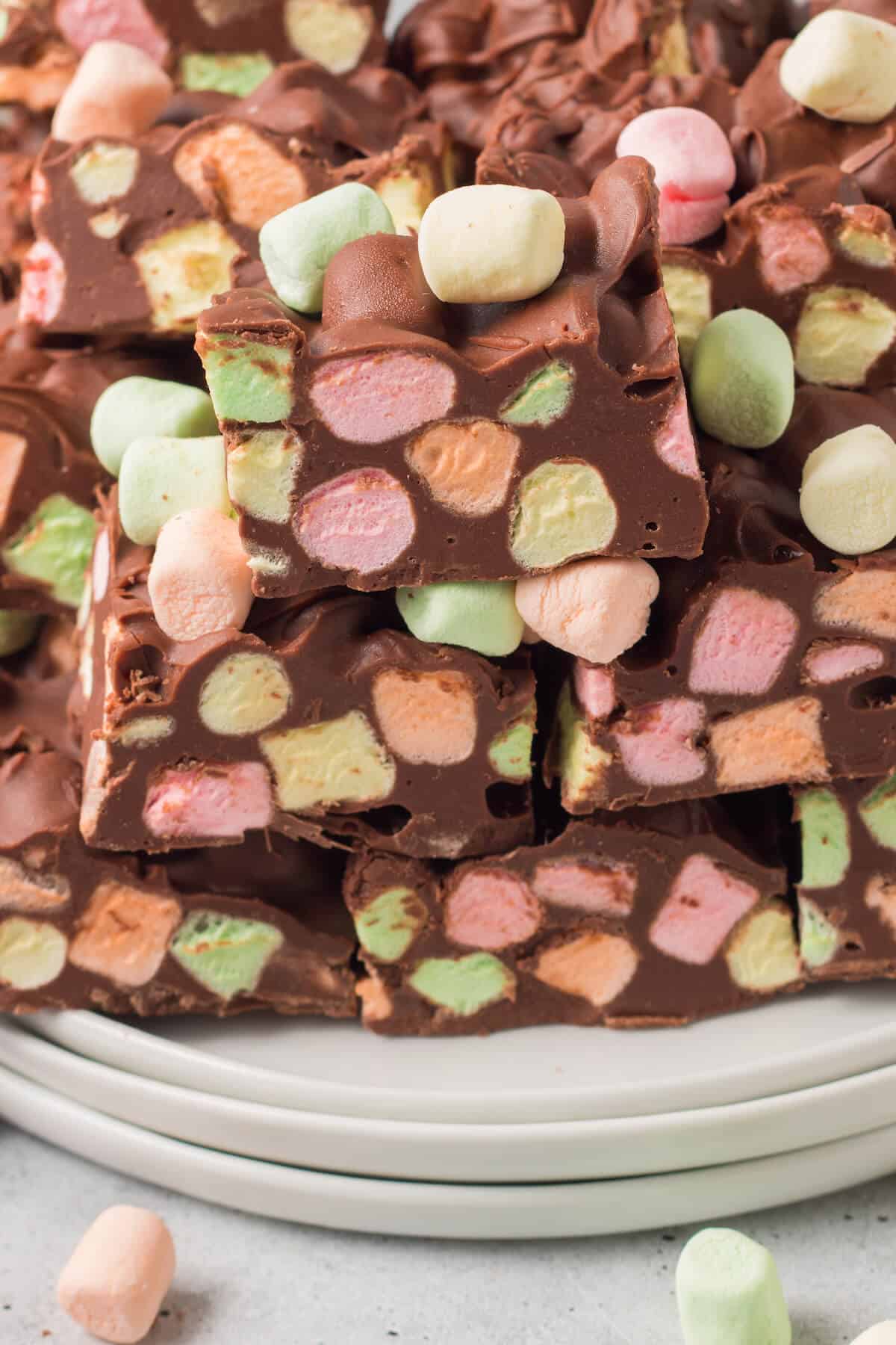 Chocolate confetti bars piled on a plate.