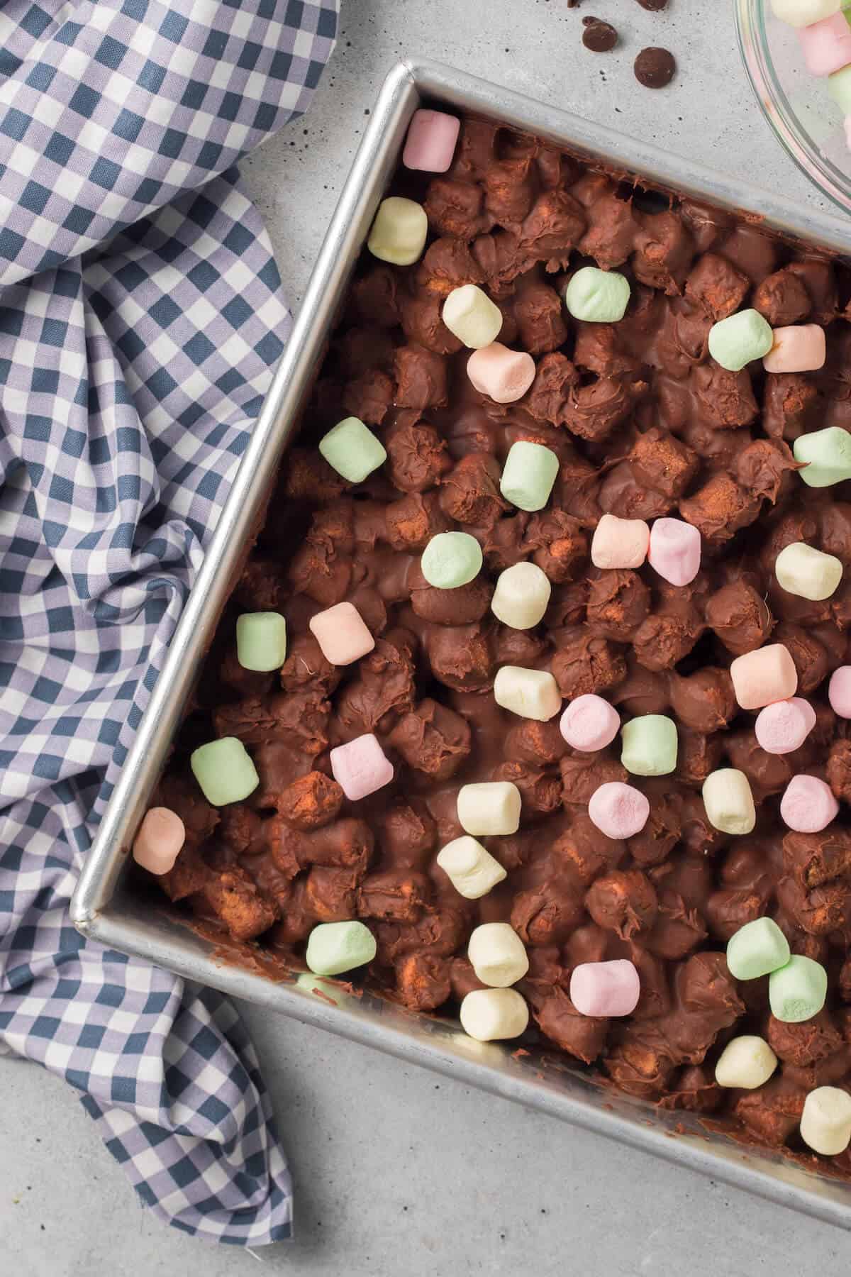 Chocolate confetti bars in a pan.