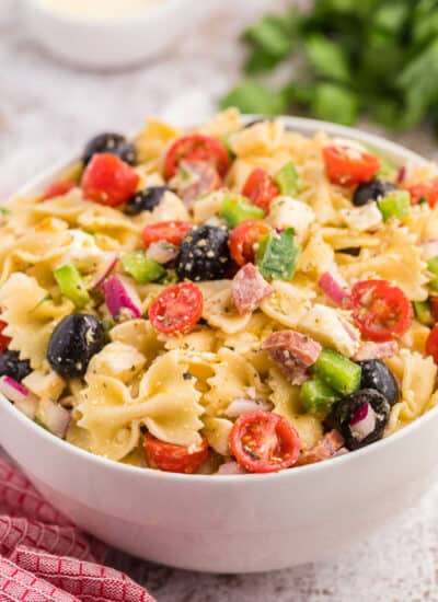 Italian pasta salad in a white bowl.