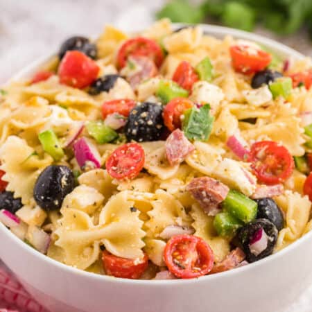 Italian pasta salad in a white bowl.