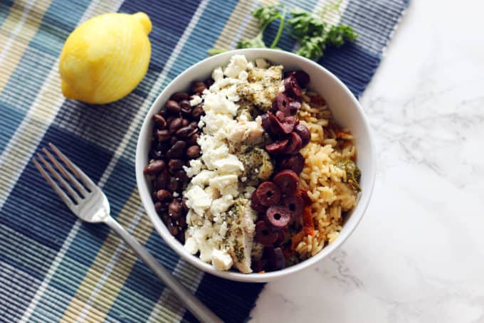 Mediterranean Chicken and Rice Bowl - Pile all your Greek favorites into one bowl for the perfect lunch or dinner! This easy recipe is perfect for meal prep and very versatile.