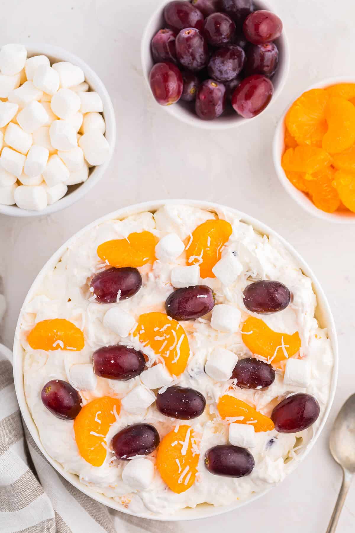 Creamy fruit salad in a bowl.