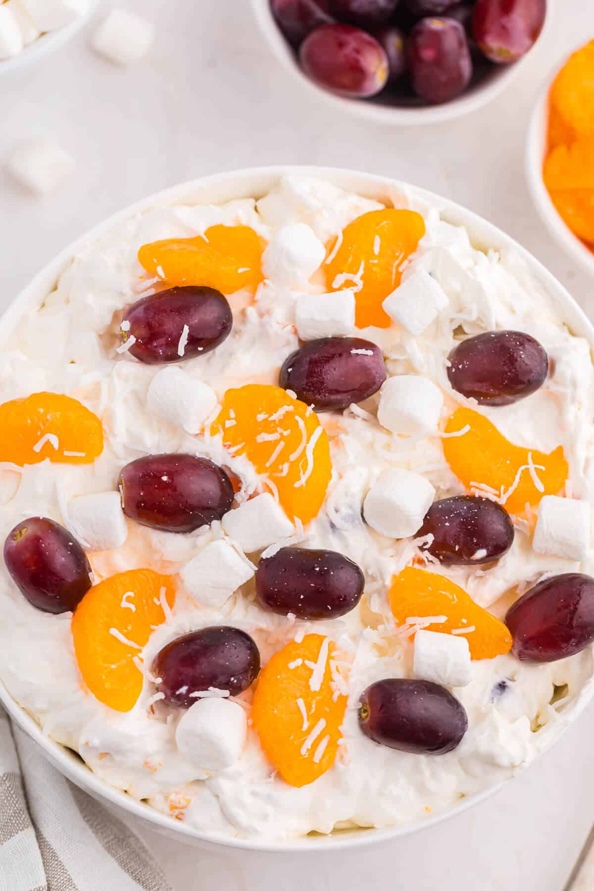 Creamy fruit salad in a bowl.