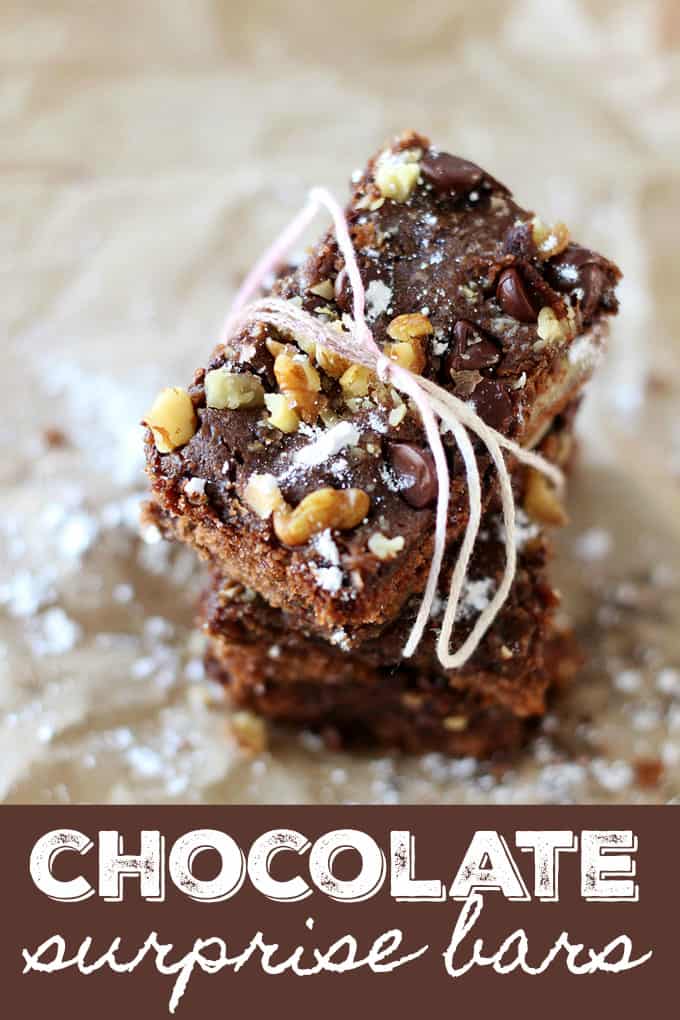 Chocolate Surprise Bars - Topped with crumbled walnuts and rich chocolate morsels, these are the easiest and most delicious homemade bars you’ll ever make!