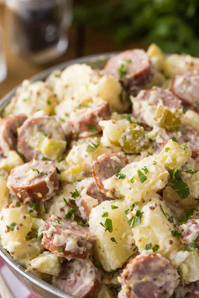 German Sausage & Potato Salad - This side dish is a whole meal! This smoky potato salad is filled with chicken sausage and a flavorful dressing with mustard.