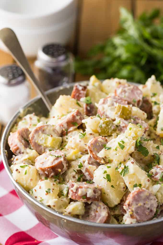 German Sausage & Potato Salad - This side dish is a whole meal! This smoky potato salad is filled with chicken sausage and a flavorful dressing with mustard.