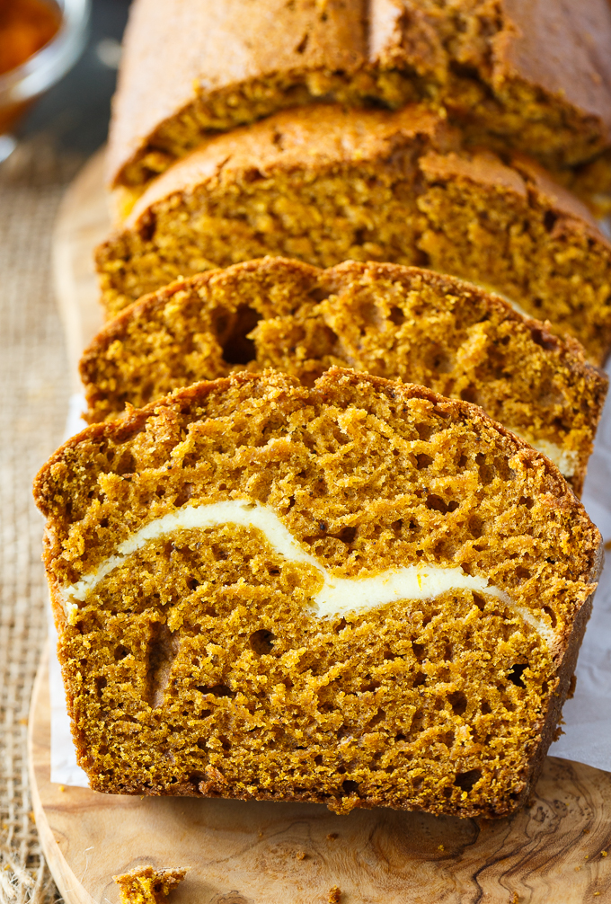 Pumpkin Ribbon Bread - Moist, delicious and packed full of pumpkin flavour. You'll love the decadent and creamy cheesecake filling inside every slice.