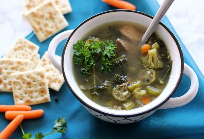 Very Veggie Chicken and Rice Soup - One of the healthiest soups ever! This hearty chicken soup with black and white rice is filled with vegetables like broccoli, kale, celery, carrots, and okra. So filling and delicious!