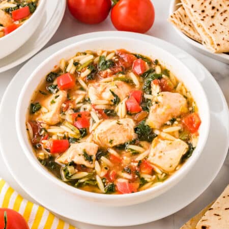 Greek Chicken Orzo Soup in a bowl.