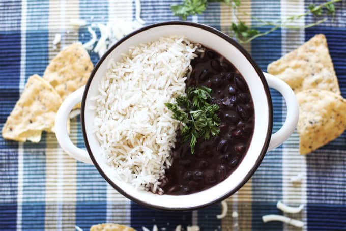 Slow Cooker Black Beans - Make the best dried black beans in the Crockpot! This bean recipe requires no soaking and simmers all day while you're at work for the easiest Taco Tuesday side dish.