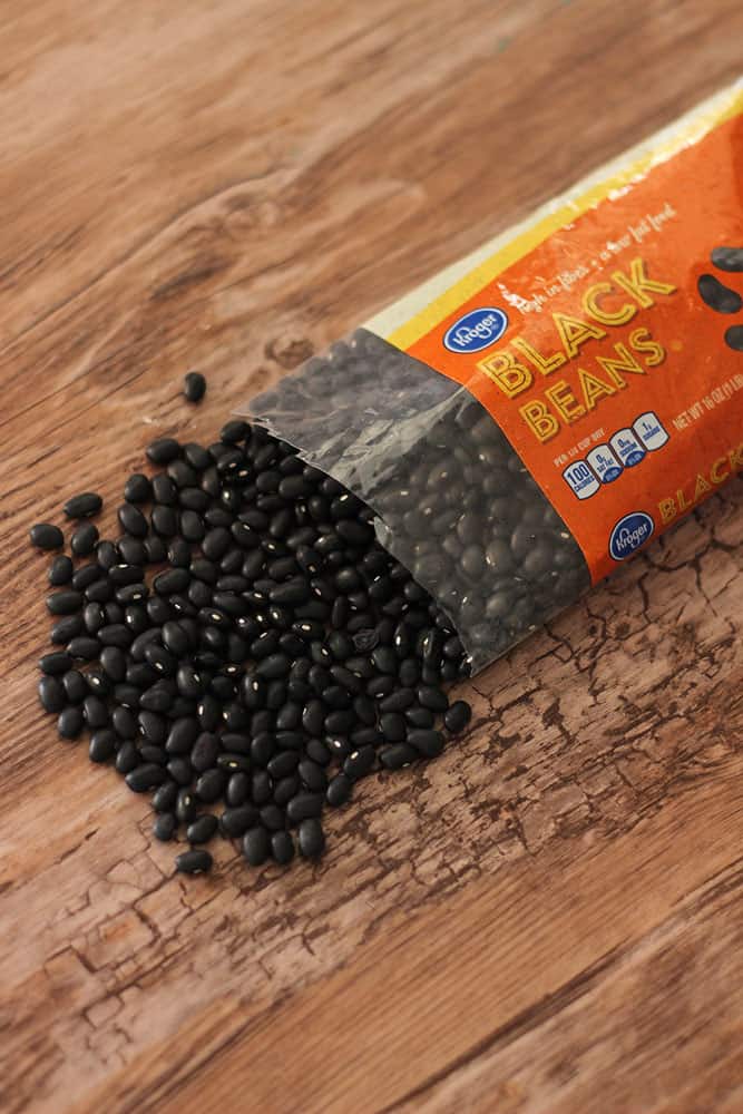Serve up these easy Slow Cooker Black Beans! A gluten free and vegetarian recipe that is so simple to make. If you want to cook dried black beans this recipe is perfect for you.