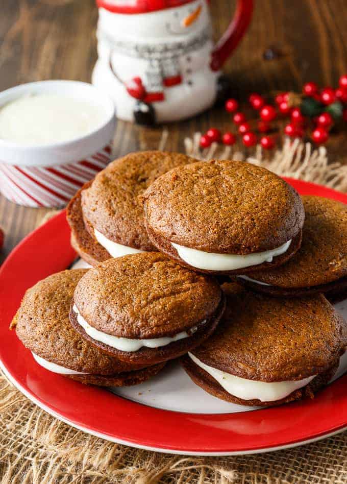 Gingerbread Whoopie Pies - Each bite is a burst of holiday flavours with the spicy gingerbread cake and the creamy, sweet richness of the cream cheese filling.