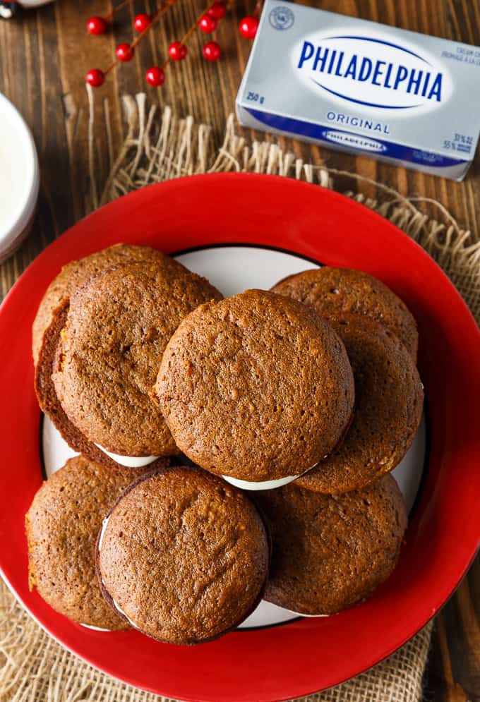 Gingerbread Whoopie Pies - Each bite is a burst of holiday flavours with the spicy gingerbread cake and the creamy, sweet richness of the cream cheese filling.