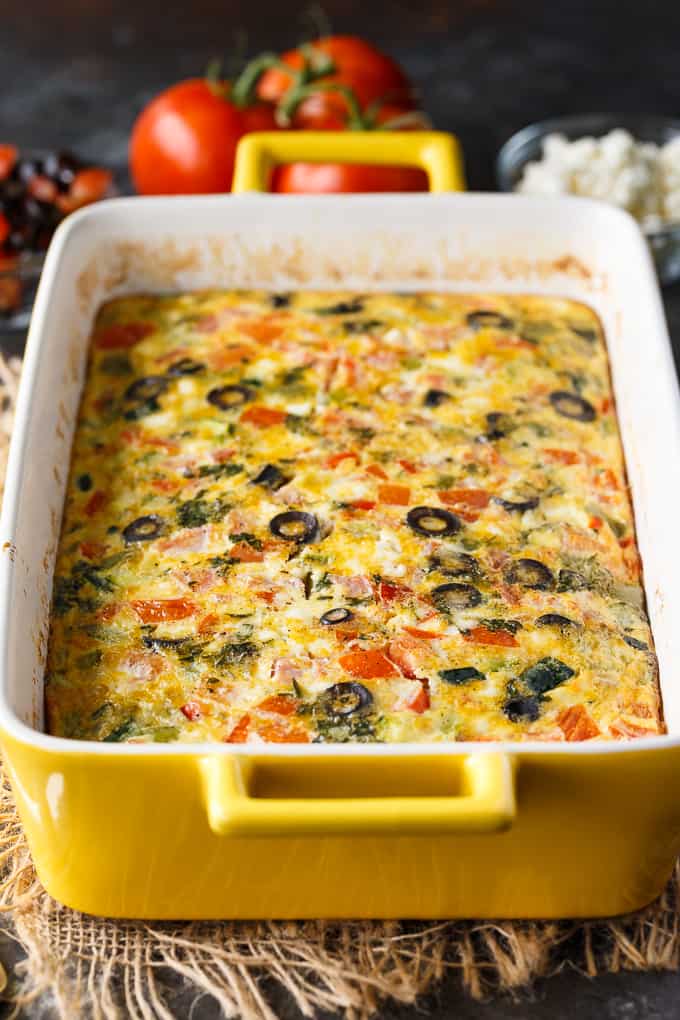 Mediterranean Brunch Bake - Packed with the distinct flavours of the Mediterranean, including salty feta and olives, fresh herbs and loads of veggies, this is the perfect vegetarian brunch dish!