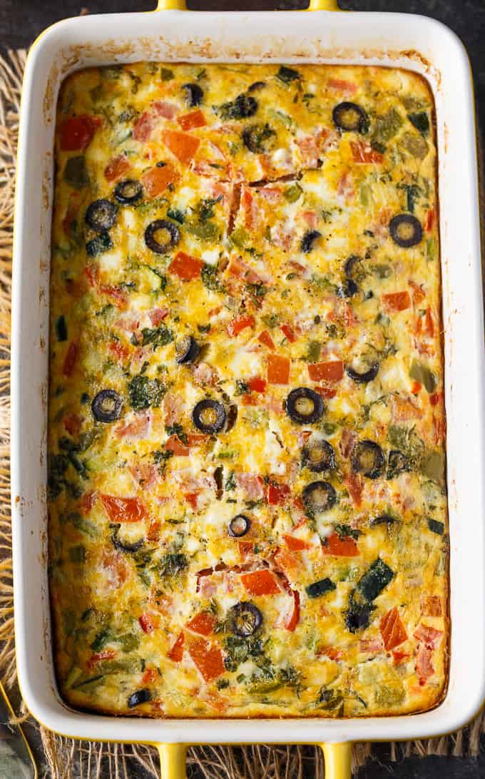 Mediterranean Brunch Bake - Packed with the distinct flavours of the Mediterranean, including salty feta and olives, fresh herbs and loads of veggies, this is the perfect vegetarian brunch dish!