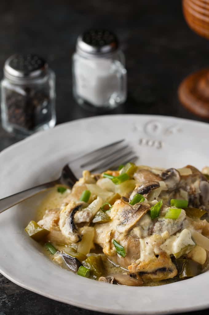 Smothered Chicken - This easy chicken and mushrooms recipe is as delicious as it smells! Cozy, comfort food perfect to enjoy in the frosty weather. 