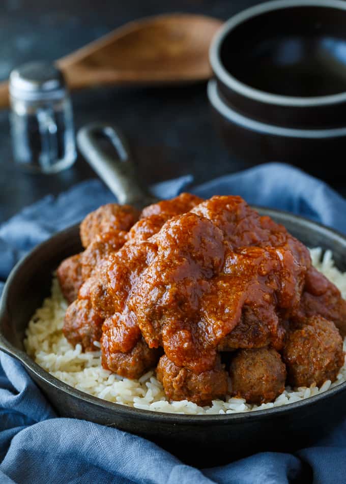 Tangy Sweet and Sour Meatballs - These delicious and freezer-friendly meatballs are simmered in a mouthwatering sauce for the easiest recipe ever! Serve over rice or on toothpicks for a tantalizing appetizer. 